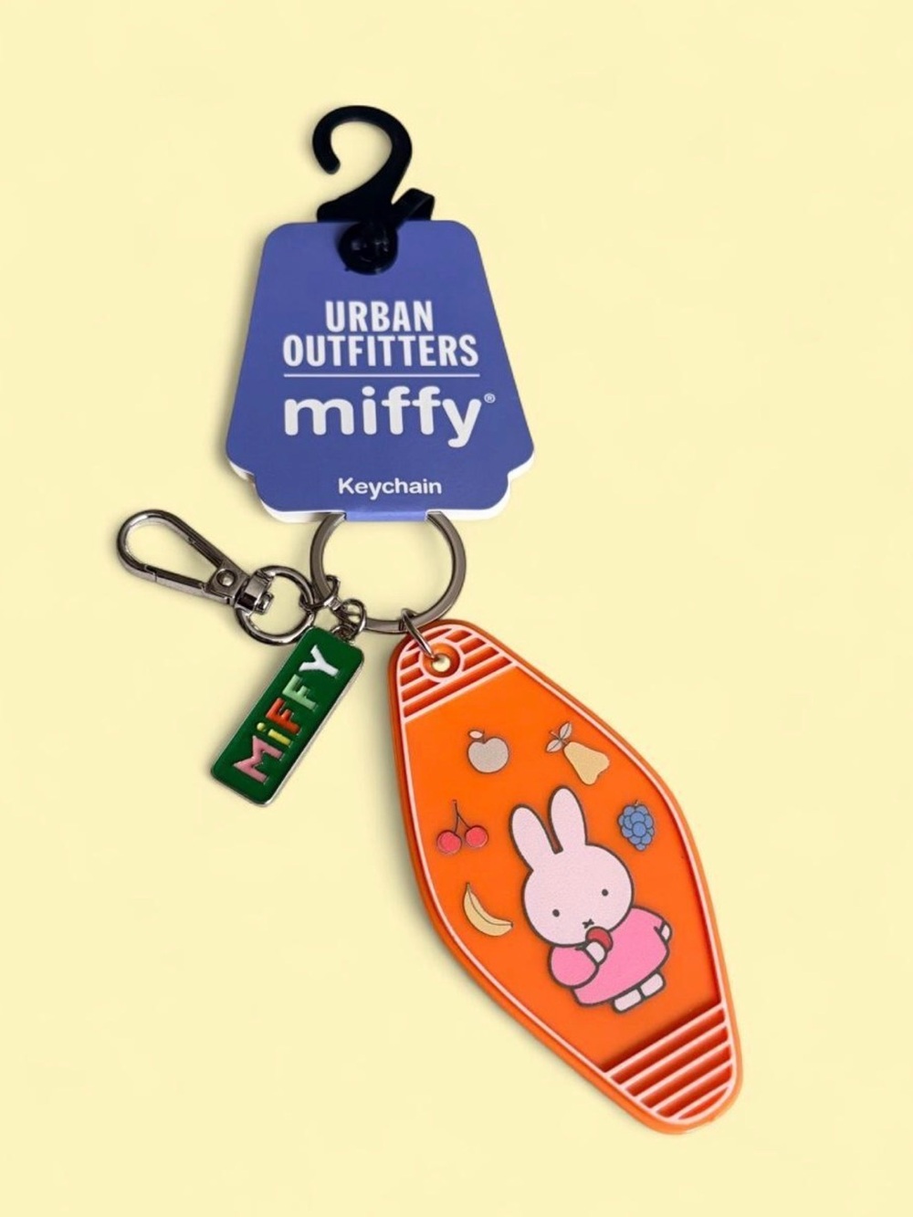 Sold out Urban Outfitters Orange Motel Tag Keychain with Silver Hardware